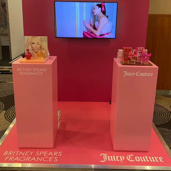 White square display plinth in retail setting