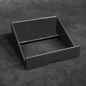 Low profile universal monitor hide in black with a cable cut-out in the front panel