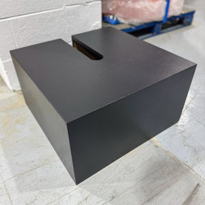 Slotted tank trap cover in black photographed in the Premier Woodshop workshop
