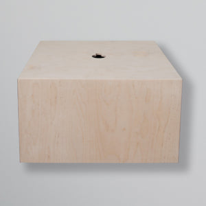 Tank trap cover in birch plywood with a cable hole in the top