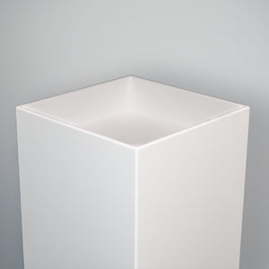 White dropped top display plinth close-up